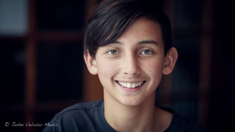Portrait of a smiling boy in soft light