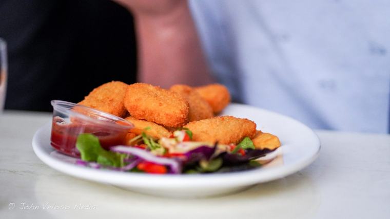 Golden fried bites with salad