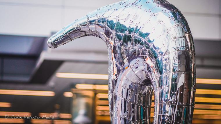 Chrome sculpture reflecting the city