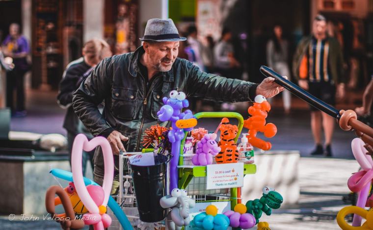 Balloon artist at work in the mall