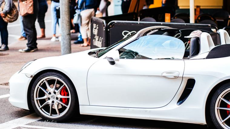White convertible parked on the street